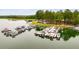 Scenic lake view featuring a well-equipped marina with numerous boat slips, offering easy access to water activities at 10213 Tall Pine Ct, Villa Rica, GA 30180
