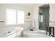 Bathroom includes a jacuzzi tub and a glass door shower at 3290 Coachmans Ne Way, Roswell, GA 30075