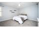 Cozy bedroom with ceiling fan and carpet at 3290 Coachmans Ne Way, Roswell, GA 30075
