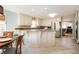 Kitchen featuring stainless steel appliances, stone countertops, and white cabinetry at 3290 Coachmans Ne Way, Roswell, GA 30075