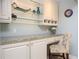 Office area with custom cabinetry, granite countertops, and a comfortable chair at 3290 Coachmans Ne Way, Roswell, GA 30075