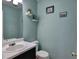 Cozy bathroom with a classic sink and toilet at 566 Lullingstone Se Dr, Marietta, GA 30067