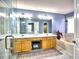 Bright bathroom with double sinks, vanity, and bathtub, designed for comfort and convenience at 566 Lullingstone Se Dr, Marietta, GA 30067
