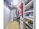 Walk-in closet with built-in shelving and ample storage space, perfect for organizing clothes and accessories at 566 Lullingstone Se Dr, Marietta, GA 30067