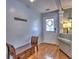 Inviting entryway with hardwood floors and a bench, creating a warm welcome for guests at 566 Lullingstone Se Dr, Marietta, GA 30067
