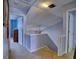 Upstairs hallway featuring carpet, two doors, and light blue paint, providing access to other rooms in the house at 566 Lullingstone Se Dr, Marietta, GA 30067