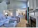 Open concept living room leading into the kitchen and dining area at 566 Lullingstone Se Dr, Marietta, GA 30067