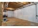Unfinished basement with concrete floor and white walls, ready for your creative design ideas at 580 Cliftwood Ct, Sandy Springs, GA 30328