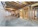 Unfinished basement with exposed beams and concrete floor at 580 Cliftwood Ct, Sandy Springs, GA 30328