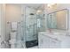 Modern bathroom with a glass-enclosed shower, sleek fixtures, and a stylish vanity at 580 Cliftwood Ct, Sandy Springs, GA 30328