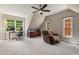 Cozy bedroom with large windows, soft carpet, and a comfortable reading nook at 580 Cliftwood Ct, Sandy Springs, GA 30328