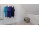 Small walk-in closet with shelving, a hanging rod, and safe at 580 Cliftwood Ct, Sandy Springs, GA 30328