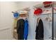 Organized walk-in closet featuring ample shelving and hanging space for clothes and accessories at 580 Cliftwood Ct, Sandy Springs, GA 30328