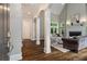 Elegant foyer with hardwood floors, soaring ceilings, and views of the living room, creating a grand entrance at 580 Cliftwood Ct, Sandy Springs, GA 30328