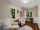 Inviting sitting room with wainscoting and windows, perfect for relaxation and reading at 580 Cliftwood Ct, Sandy Springs, GA 30328