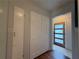 Hallway area with closet space and updated doorway at 910 Oriole Se Ln, Marietta, GA 30067