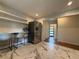 Kitchen featuring stainless steel appliances, marble floors and breakfast bar seating at 910 Oriole Se Ln, Marietta, GA 30067