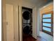 Laundry area with stackable washer and dryer next to doorway at 910 Oriole Se Ln, Marietta, GA 30067
