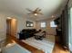 Inviting living room with hardwood floors, modern furniture, and a neutral color scheme at 910 Oriole Se Ln, Marietta, GA 30067