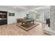Recreation room with pool table, foosball, dart board, and an indoor outdoor entertainment experience at 1240 Bridgewater Walk, Snellville, GA 30078