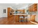 Bright and airy kitchen featuring wooden cabinets, stainless steel appliances and granite countertops at 1240 Bridgewater Walk, Snellville, GA 30078