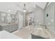 Open bathroom featuring dual vanities and a glass-enclosed shower at 1240 Bridgewater Walk, Snellville, GA 30078
