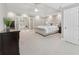 Large main bedroom with view to a luxurious ensuite bathroom with soaking tub at 1240 Bridgewater Walk, Snellville, GA 30078