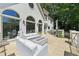 Elegant outdoor patio with comfortable seating and a modern fire pit, perfect for relaxing at 1240 Bridgewater Walk, Snellville, GA 30078