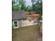Backyard aerial featuring a patio, fire pit, and pergola, for outdoor gatherings at 2320 Glynmoore Dr, Lawrenceville, GA 30043
