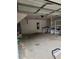 Spacious two car garage with ample storage space and a functional work area at 2320 Glynmoore Dr, Lawrenceville, GA 30043