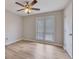 Comfortable bedroom featuring wood-look floors and natural light at 2673 Deerfield Sw Cir, Marietta, GA 30064