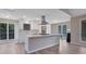 Kitchen with white cabinets, stainless steel appliances and a large kitchen island at 2673 Deerfield Sw Cir, Marietta, GA 30064