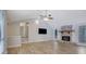 Bright living room with vaulted ceilings, stone fireplace, and wood-look flooring at 2673 Deerfield Sw Cir, Marietta, GA 30064