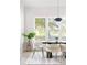 Elegant dining room with large windows and modern decor at 104 Meldon Ave, Atlanta, GA 30315
