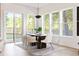 Open dining room with slider doors, leading to an outdoor space at 104 Meldon Ave, Atlanta, GA 30315