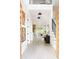 Hallway showcasing light wood floors, high ceilings, and contemporary design elements at 104 Meldon Ave, Atlanta, GA 30315