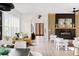Open-concept living area with bright interiors, hardwood floors, and stylish furniture at 104 Meldon Ave, Atlanta, GA 30315