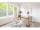 Office space with large windows, modern furniture, and natural light at 104 Meldon Ave, Atlanta, GA 30315