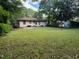 Expansive backyard with a large lawn area, perfect for outdoor activities and relaxation at 3127 Latona Sw Dr, Atlanta, GA 30354