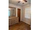 Bedroom featuring a ceiling fan, a window, and a dresser at 3127 Latona Sw Dr, Atlanta, GA 30354