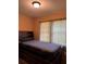 Bedroom with a built-in bed frame and a window covered by a sheer curtain at 3127 Latona Sw Dr, Atlanta, GA 30354