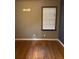 Bedroom with hardwood floors and natural light from the window at 3127 Latona Sw Dr, Atlanta, GA 30354