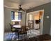 Inviting dining area with seating for four, tile flooring, and natural light at 3127 Latona Sw Dr, Atlanta, GA 30354