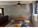 Cozy dining area with round table, chairs, and a ceiling fan, perfect for Gathering meals at 3127 Latona Sw Dr, Atlanta, GA 30354