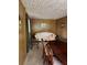 Dining room boasting wood paneling, neutral carpet and classic furniture at 3127 Latona Sw Dr, Atlanta, GA 30354