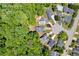 Aerial view shows the home location and surrounding wooded lot at 415 Stephanie Ct, Stockbridge, GA 30281