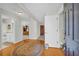 Inviting foyer featuring hardwood floors and views into other rooms of the home at 415 Stephanie Ct, Stockbridge, GA 30281