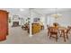 Spacious living room and dining room with fireplace and chandelier at 415 Stephanie Ct, Stockbridge, GA 30281