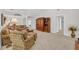 Spacious living room featuring fireplace, built in wood cabinet and lots of comfortable seating at 415 Stephanie Ct, Stockbridge, GA 30281