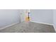 Bedroom featuring gray carpet and white trim at 740 Marcus Nyah Ct, Atlanta, GA 30349